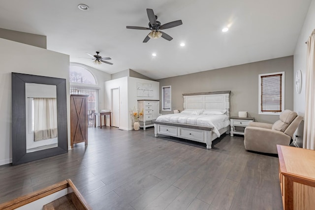 bedroom featuring ceiling fan, dark hardwood / wood-style flooring, and lofted ceiling