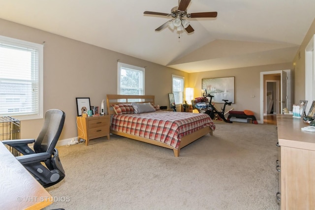 carpeted bedroom featuring ceiling fan and lofted ceiling