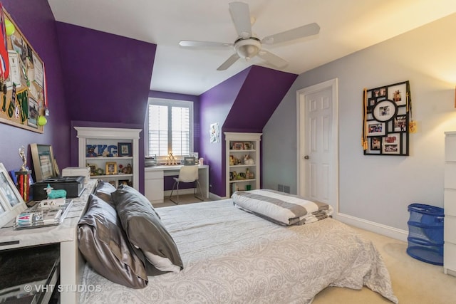 bedroom with ceiling fan, light carpet, and vaulted ceiling