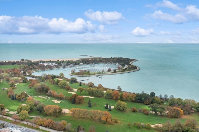 birds eye view of property featuring a water view