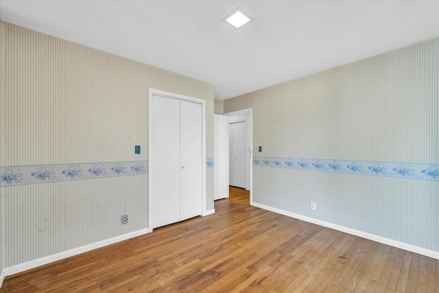 empty room featuring hardwood / wood-style floors