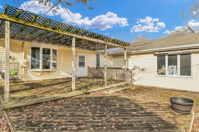 exterior space featuring a pergola and a deck