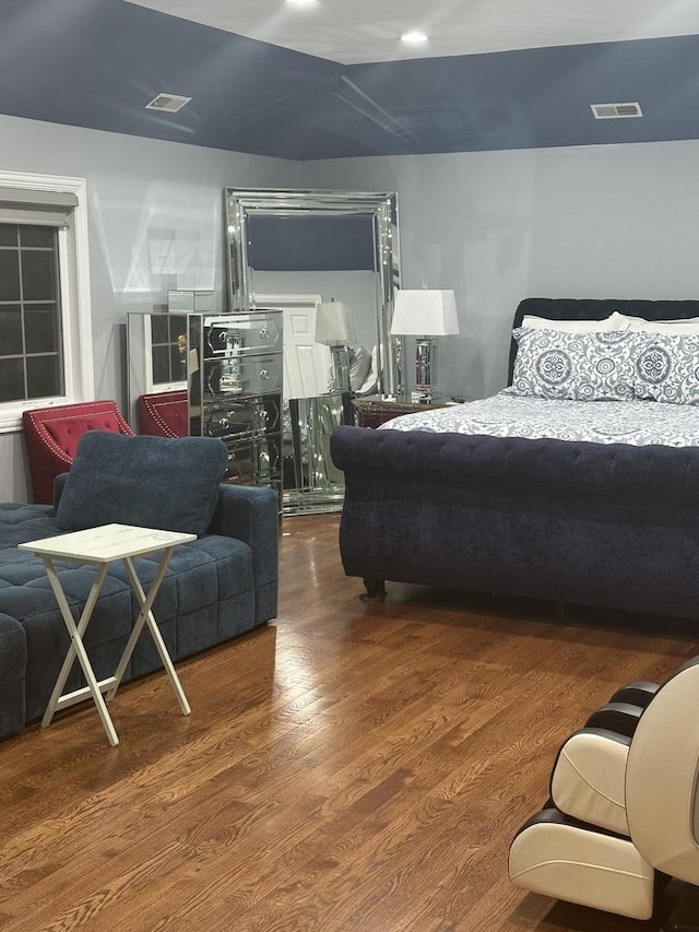 bedroom featuring wood-type flooring