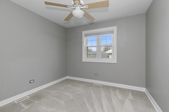 unfurnished room featuring carpet flooring and ceiling fan