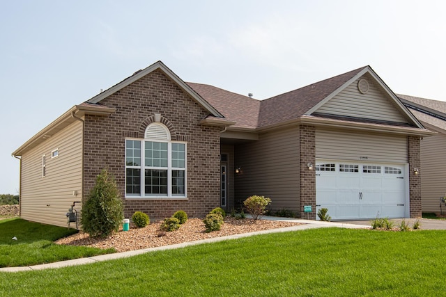 ranch-style home featuring a garage and a front lawn