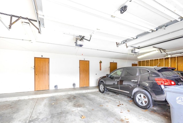 garage featuring a garage door opener