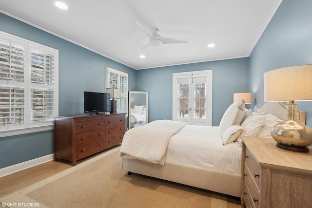 bedroom with multiple windows, crown molding, ceiling fan, and light hardwood / wood-style flooring