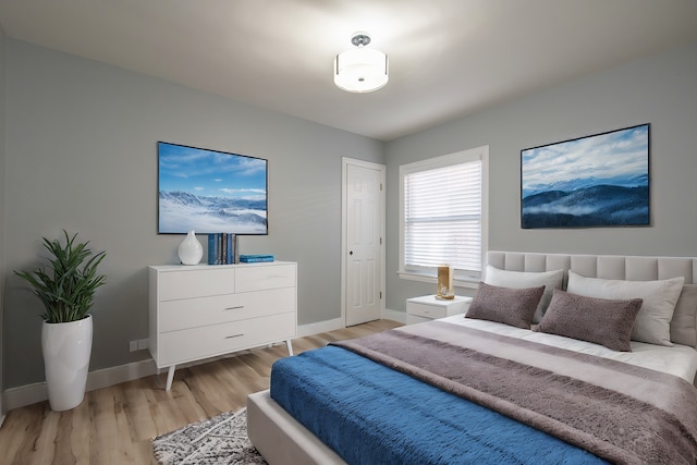 bedroom featuring light wood-type flooring