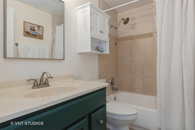 full bathroom featuring shower / bath combination with curtain, vanity, and toilet