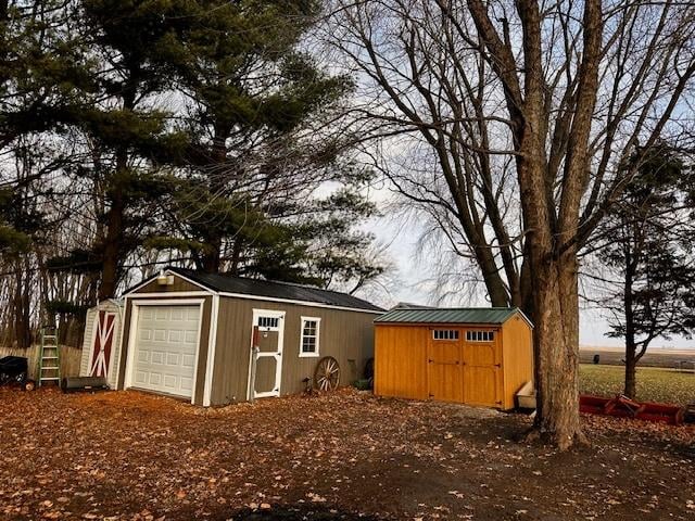 view of outbuilding featuring a garage