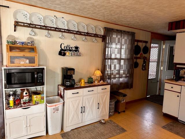 kitchen featuring white cabinets