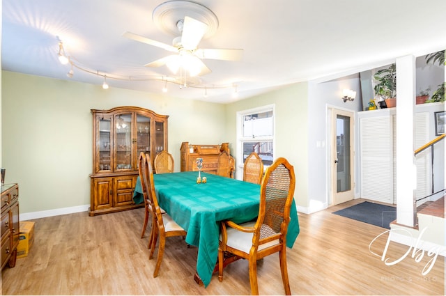 dining area featuring ceiling fan and light hardwood / wood-style flooring