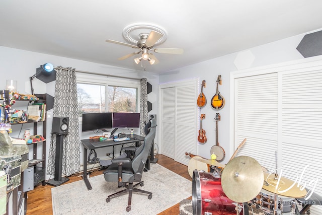 office space with ceiling fan and wood-type flooring