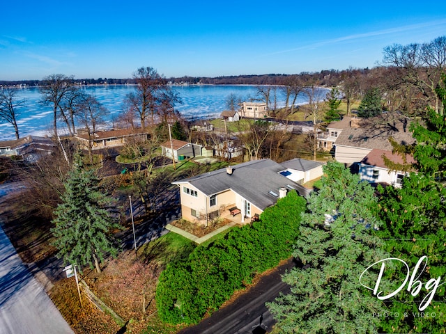 drone / aerial view with a water view