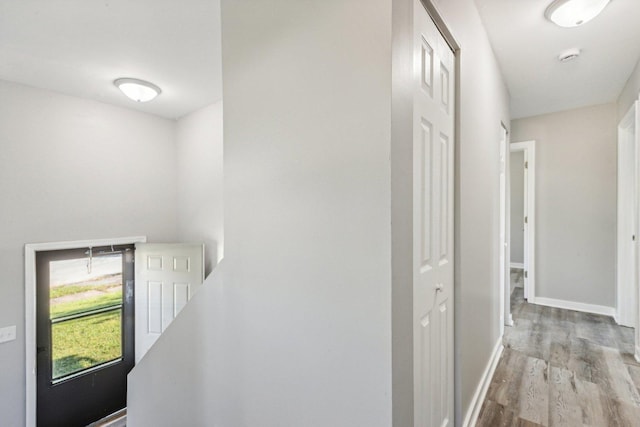 hall featuring light wood-type flooring