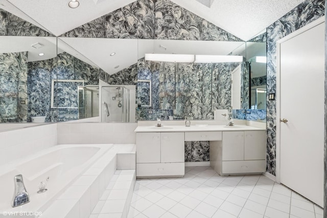 bathroom featuring plus walk in shower, a textured ceiling, tile patterned floors, and vaulted ceiling