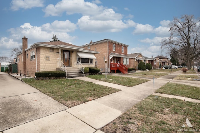 view of front of property with a front lawn