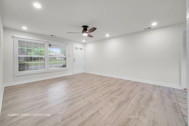 1607 Warwick Ln, Schaumburg, IL 60193 - spare room with ceiling fan, baseboards, light wood-style floors, and recessed lighting
