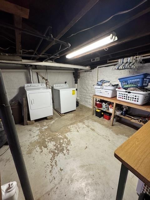 basement with washing machine and clothes dryer