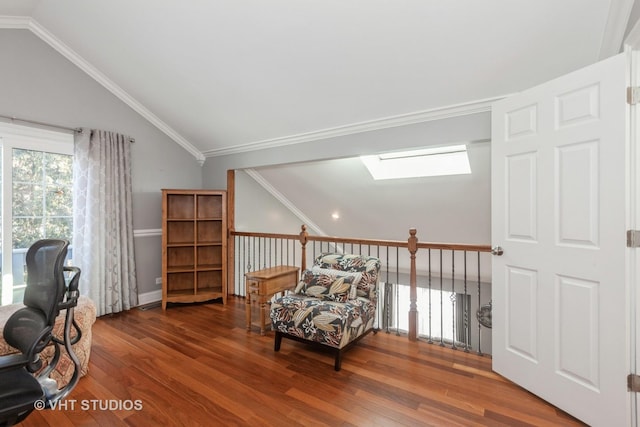 office with crown molding, lofted ceiling with skylight, and hardwood / wood-style floors