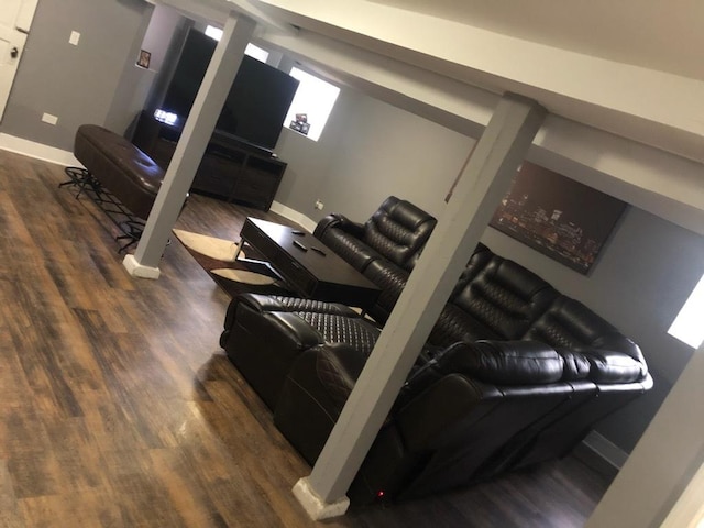 living room featuring dark wood-type flooring