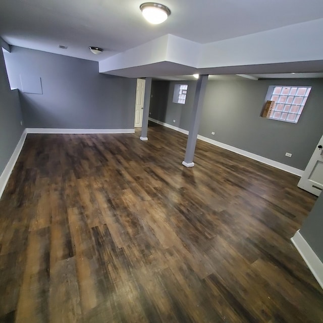 basement featuring dark wood-type flooring