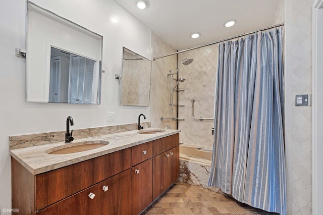 bathroom featuring shower / tub combo with curtain and vanity