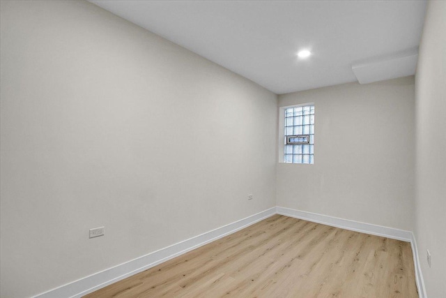 unfurnished room featuring light hardwood / wood-style flooring