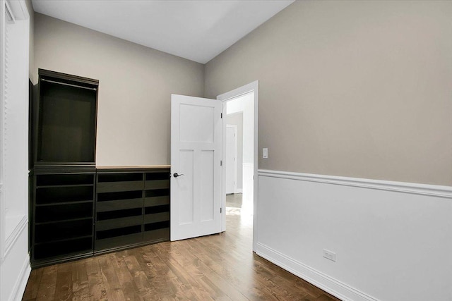 empty room featuring hardwood / wood-style flooring