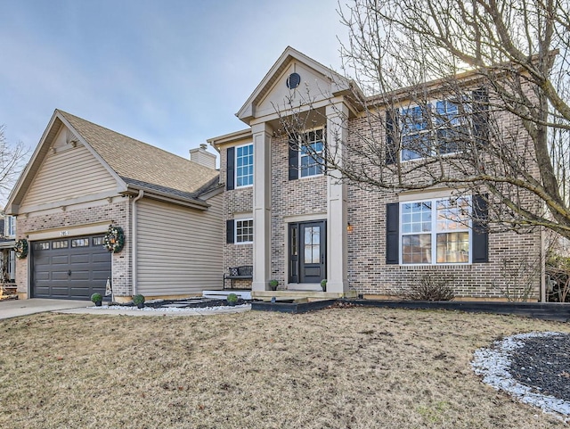 view of front of home with a garage