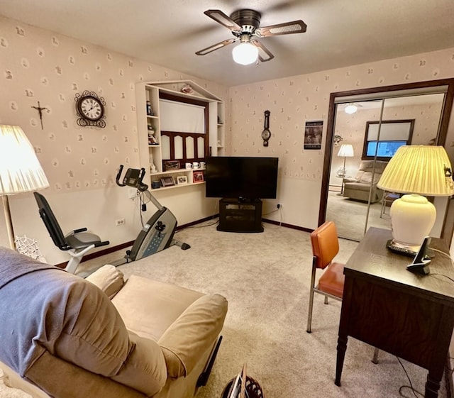 living room with ceiling fan and light colored carpet