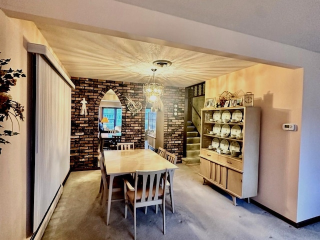 wine room featuring carpet flooring and brick wall