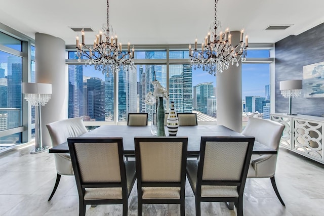 dining room with floor to ceiling windows and a chandelier