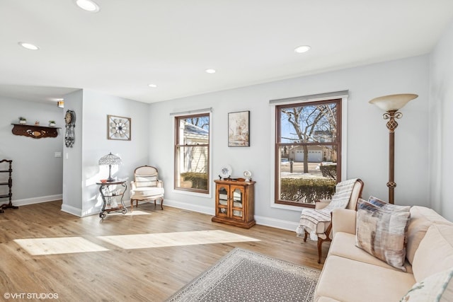 sitting room with light hardwood / wood-style floors