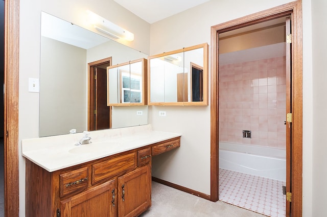 bathroom with vanity and baseboards