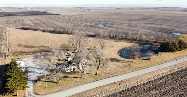 birds eye view of property featuring a rural view