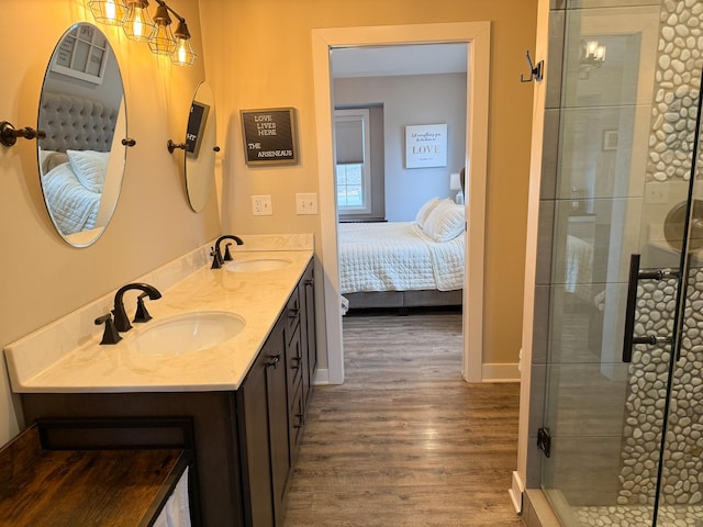 bathroom featuring vanity and hardwood / wood-style flooring