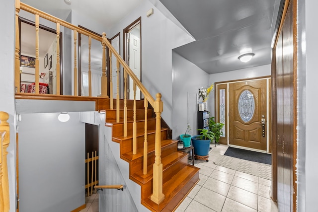 foyer with light tile patterned floors