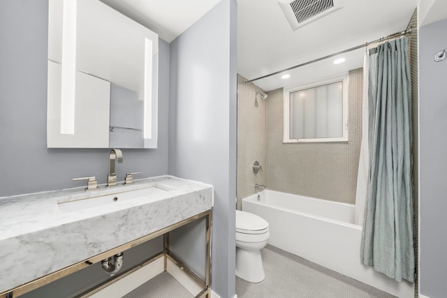 full bathroom featuring vanity, toilet, and shower / bathtub combination with curtain