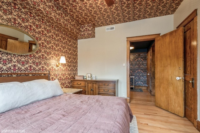 bedroom with light hardwood / wood-style flooring