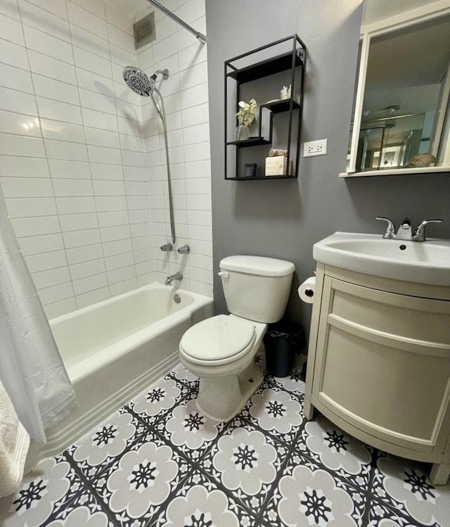 full bathroom featuring vanity, toilet, and shower / tub combo with curtain