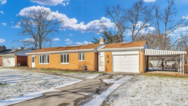 ranch-style home featuring a garage