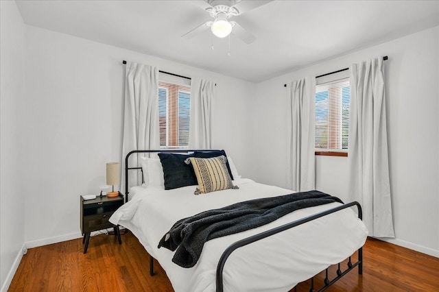 bedroom featuring ceiling fan and hardwood / wood-style flooring