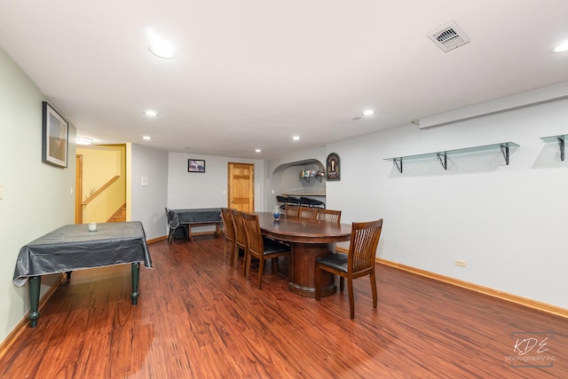 dining area featuring recessed lighting, wood finished floors, visible vents, and baseboards