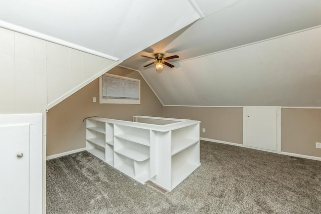 additional living space with carpet, vaulted ceiling, and ceiling fan