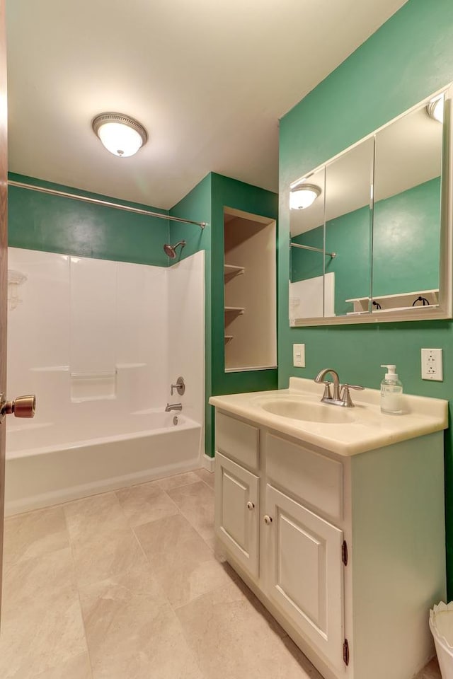 bathroom featuring vanity and shower / bath combination