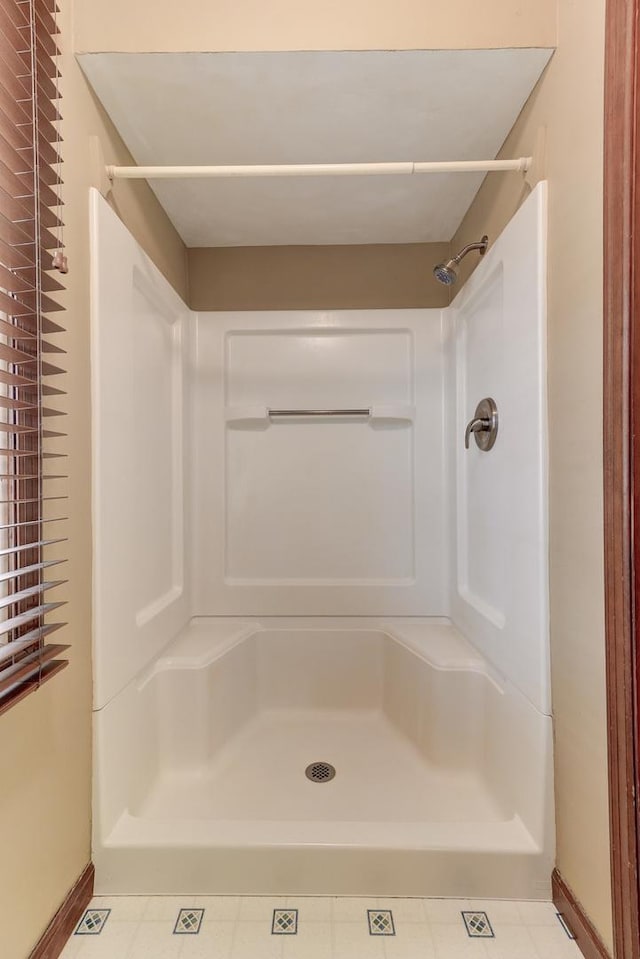 bathroom featuring walk in shower