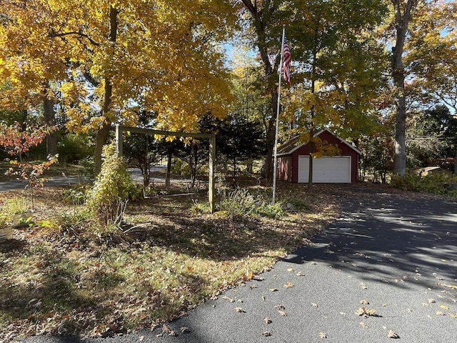 view of front of house with an outbuilding and a garage