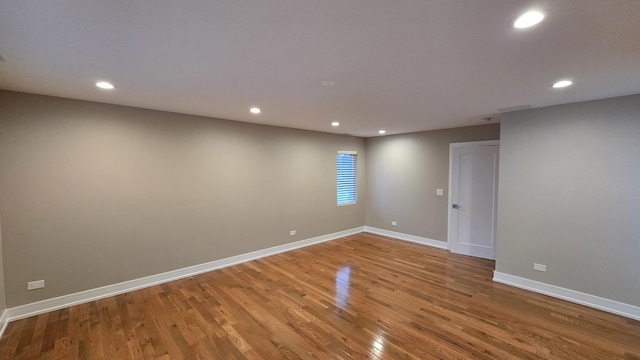 spare room featuring hardwood / wood-style floors