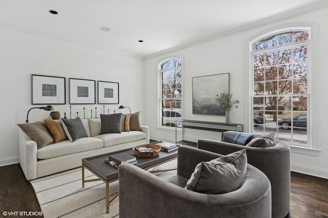 living room with dark hardwood / wood-style floors and crown molding